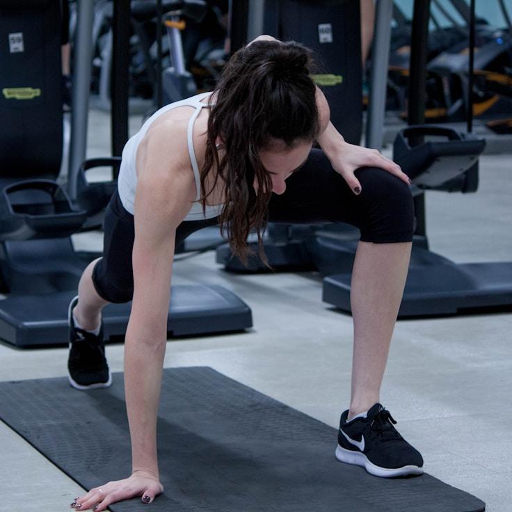 Group fitness class in a modern studio setting